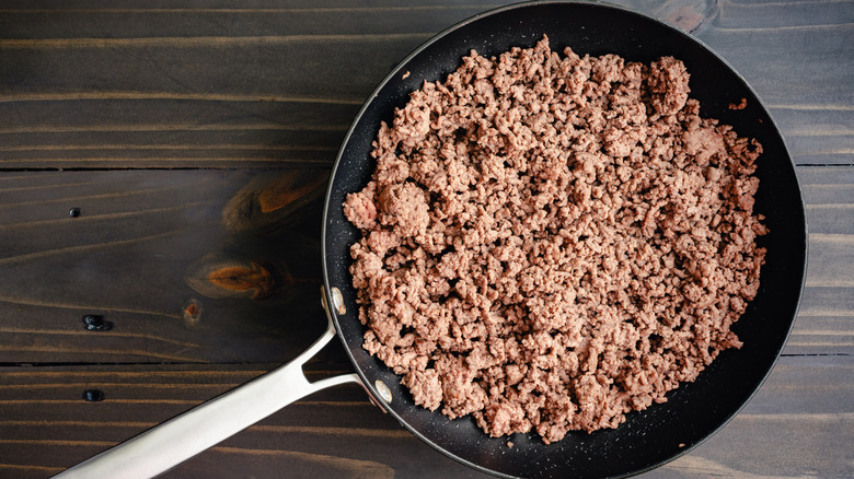 Cooked ground beef in pan